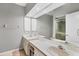 Bathroom with double vanity and shower at 7242 Villa D Este Dr, Sarasota, FL 34238