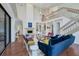 Living room with hardwood floors, fireplace, and comfortable seating area at 7242 Villa D Este Dr, Sarasota, FL 34238