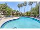 Community pool with spa and plenty of lounge chairs at 7242 Villa D Este Dr, Sarasota, FL 34238