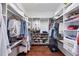 Large walk-in closet with ample shelving and hanging space at 7242 Villa D Este Dr, Sarasota, FL 34238
