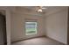 Bright bedroom with ceiling fan and window at 7307 Fountain Palm Cir # 7-102, Bradenton, FL 34203