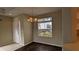 Dining area with dark laminate floors and a chandelier at 7307 Fountain Palm Cir # 7-102, Bradenton, FL 34203