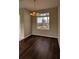Dining area with dark laminate floors and a chandelier at 7307 Fountain Palm Cir # 7-102, Bradenton, FL 34203