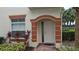 Front door entrance with brick walkway at 7307 Fountain Palm Cir # 7-102, Bradenton, FL 34203