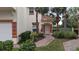 Front entry with walkway and landscaping at 7307 Fountain Palm Cir # 7-102, Bradenton, FL 34203