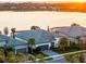 Luxury homes with lake views at sunset at 788 Sigsbee Loop, Sarasota, FL 34240