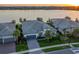 Luxury home on lakefront lot with sunset view at 788 Sigsbee Loop, Sarasota, FL 34240