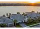 Luxury home on lakefront lot with sunset view at 788 Sigsbee Loop, Sarasota, FL 34240