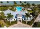 Resort-style pool with clubhouse and lush landscaping at 788 Sigsbee Loop, Sarasota, FL 34240