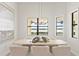 Light and airy dining room with water views at 788 Sigsbee Loop, Sarasota, FL 34240