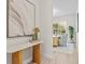 Stylish entryway with a console table and view into the office at 788 Sigsbee Loop, Sarasota, FL 34240