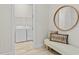 Convenient laundry room with washer, dryer, and bench at 788 Sigsbee Loop, Sarasota, FL 34240