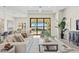 Spacious living room with access to pool area at 788 Sigsbee Loop, Sarasota, FL 34240