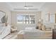 Spacious main bedroom with light and airy feel, plantation shutters and water views at 788 Sigsbee Loop, Sarasota, FL 34240