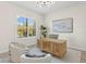 Spacious home office with large windows and comfortable seating at 788 Sigsbee Loop, Sarasota, FL 34240