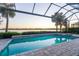 Enjoy sunsets from this lovely screened pool and spa at 788 Sigsbee Loop, Sarasota, FL 34240