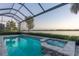 Spacious pool and spa with a screened lanai and lake view at 788 Sigsbee Loop, Sarasota, FL 34240