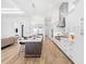 Bright, modern kitchen with a large island, stainless steel appliances, and an open concept design at 8367 Sea Glass Ct, Sarasota, FL 34240