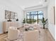 Comfortable living room with stylish decor, natural light, and a view of the outdoors at 8367 Sea Glass Ct, Sarasota, FL 34240