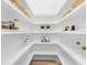 Well-organized pantry with ample shelving for storage at 8367 Sea Glass Ct, Sarasota, FL 34240