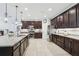 Modern kitchen with granite countertops and ample cabinetry at 11113 Coventry Grove Cir, Lithia, FL 33547