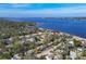 Wide shot of waterfront homes and lush tropical landscape at 118 24Th W St, Bradenton, FL 34205