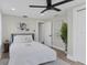 Spacious bedroom with neutral decor, hardwood floors, and ample light at 118 24Th W St, Bradenton, FL 34205