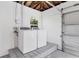 Convenient laundry area with washer, dryer, and garage access at 118 24Th W St, Bradenton, FL 34205