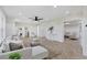 Bright living room with herringbone floors and modern furniture at 118 24Th W St, Bradenton, FL 34205