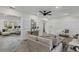 Living area with herringbone floors, neutral tones, and stylish decor at 118 24Th W St, Bradenton, FL 34205