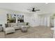 Open living area with herringbone floors and a neutral color palette at 118 24Th W St, Bradenton, FL 34205