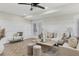 Open living space featuring a neutral color palette and herringbone floors at 118 24Th W St, Bradenton, FL 34205
