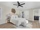 Spacious bedroom with a neutral color palette and comfortable bedding at 118 24Th W St, Bradenton, FL 34205