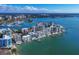 Wide aerial view of waterfront community and marina at 174 Golden Gate Pt # 11, Sarasota, FL 34236