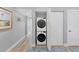 Convenient laundry closet with stackable washer and dryer at 174 Golden Gate Pt # 11, Sarasota, FL 34236