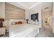 Main bedroom with a king-size bed and ensuite bathroom access at 22435 Panther Loop, Bradenton, FL 34202
