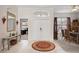 Bright and spacious foyer with tile floors and double doors at 22435 Panther Loop, Bradenton, FL 34202