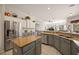 Spacious kitchen with stainless steel appliances and granite countertops at 22435 Panther Loop, Bradenton, FL 34202