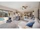 Relaxing living room with sectional sofa and pool access at 22435 Panther Loop, Bradenton, FL 34202