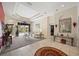 Bright living room with access to the foyer and pool area at 22435 Panther Loop, Bradenton, FL 34202