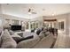 Open living space with sectional sofa and pool view at 22435 Panther Loop, Bradenton, FL 34202