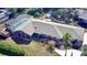 Aerial view of the home showcasing the pool, landscaping, and overall property layout at 2426 Nassau St, Sarasota, FL 34231