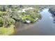 Waterway aerial view showcasing private boat lift with close neighborhood access and waterfront living at 2426 Nassau St, Sarasota, FL 34231