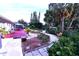 Landscaped backyard oasis with patio and walkway at 2426 Nassau St, Sarasota, FL 34231