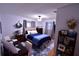 Guest bedroom with a workspace and built-in shelving at 2426 Nassau St, Sarasota, FL 34231