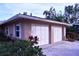 Spacious two-car garage with manicured landscaping and ample parking at 2426 Nassau St, Sarasota, FL 34231