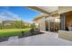 Private backyard patio with view of lush lawn at 2886 Grazeland Dr, Sarasota, FL 34240