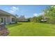Expansive grassy backyard offering ample space for recreation at 2886 Grazeland Dr, Sarasota, FL 34240