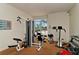 Community gym with multiple machines and weights at 2886 Grazeland Dr, Sarasota, FL 34240