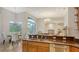 Eat-in kitchen with granite countertops and stainless steel appliances at 2886 Grazeland Dr, Sarasota, FL 34240